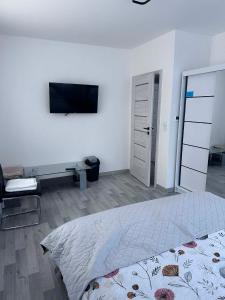 Postel nebo postele na pokoji v ubytování pokoje do wynajęcia