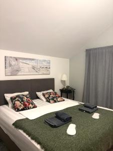 Postel nebo postele na pokoji v ubytování MiniCity Inn