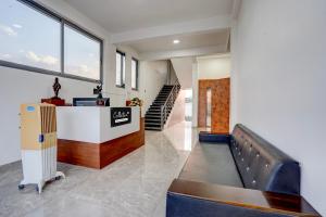 Μια τηλεόραση ή/και κέντρο ψυχαγωγίας στο Collection O Kanifnath Trek Pune +30 φωτογραφίες