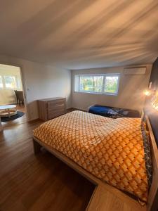 Ένα ή περισσότερα κρεβάτια σε δωμάτιο στο Appartement meublé