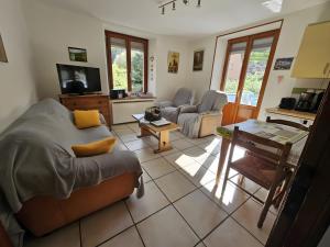 Χώρος καθιστικού στο Le Gîte À Mamie