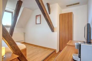 TV a/nebo společenská místnost v ubytování Casa Weidner