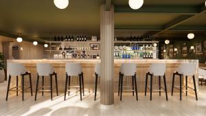 bar w restauracji z białymi stołkami w obiekcie Berthas collection by em hotels w mieście Cartagena de Indias +13 zdjęć