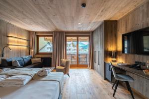 TV a/nebo společenská místnost v ubytování Dolomiten Residenz - Sporthotel Sillian