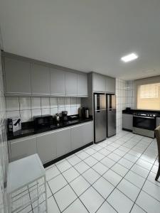 Kuchyň nebo kuchyňský kout v ubytování Casa Rede Vila