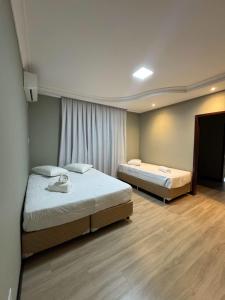 Postel nebo postele na pokoji v ubytování Casa Rede Vila + 45 fotografií