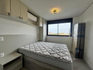 Postel nebo postele na pokoji v ubytování Oásis do Atlântico Home Clube - Apto 307 A para 4 pessoas com vista do mar + 13 fotografií