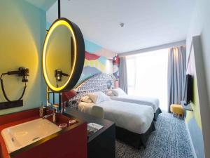 Voodi või voodid majutusasutuse ibis Styles Tbilisi Center toas +94 fotot