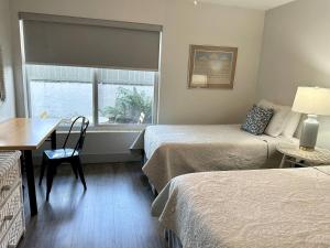 Una cama o camas en una habitación de Palmettobay #3, 2 Bedroom4 Twin Bedspark 2 Cars 3 fotos más