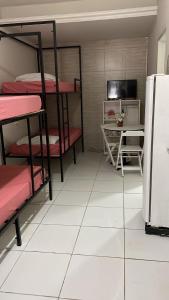 Postel nebo postele na pokoji v ubytování Studio 51 residence