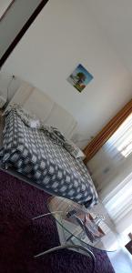 Postel nebo postele na pokoji v ubytování PENSIUNEA CARAIMAN Servicii de cazare