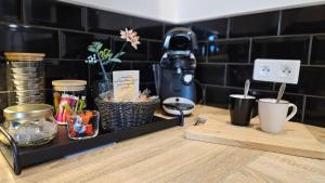 Coffee and tea making facilities at Petit maison du Vallon