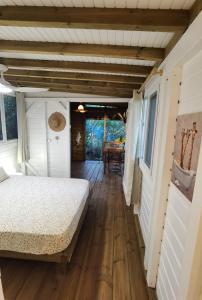 Ένα ή περισσότερα κρεβάτια σε δωμάτιο στο Kaz Coco Bungalow