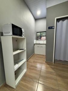 Η κουζίνα ή μικρή κουζίνα στο Milano 581 - Hospedaje temporal en Asunción