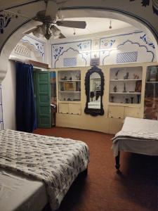 a bedroom with two beds in a room at The moon Guest House in Jodhpur +41 photos