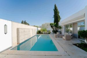 Πισίνα στο ή κοντά στο Villa Oasis Chotrana