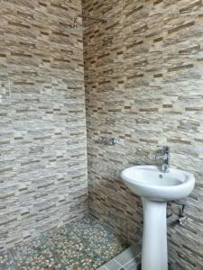 Ένα μπάνιο στο Savwa Lodges and Apartments +20 φωτογραφίες