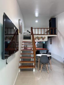 Телевизор и/или развлекательный центр в Aparment Loft Style