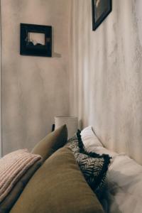 Postel nebo postele na pokoji v ubytování L'Ulivo e il Melograno - Mediterranean Studios