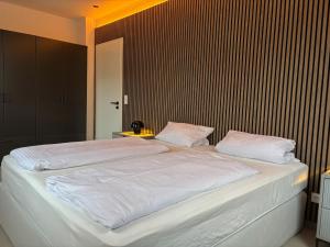 Postel nebo postele na pokoji v ubytování Apartment am Marktplatz mit XXL Garage + 21 fotografií