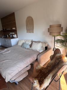 En eller flere senge i et værelse på Vista Izera