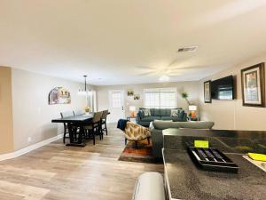 a living room with a couch and a table at Eastgate 9A Beautiful Townhouse in Hammond