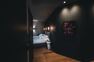 Ένα ή περισσότερα κρεβάτια σε δωμάτιο στο René-Victoire