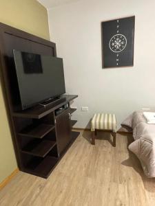 TV a/nebo společenská místnost v ubytování Lysa Paraná