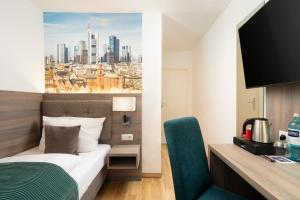 Postel nebo postele na pokoji v ubytování Sophien Hotel + 20 fotografií