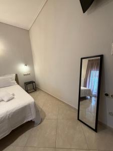 En eller flere senge i et værelse på T-Book365 Green