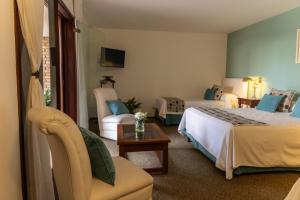 Ένα ή περισσότερα κρεβάτια σε δωμάτιο στο Hotel de la Cañada