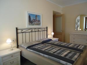 Giường trong phòng chung tại Villa Carlotta Typ C3