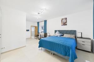 Ένα ή περισσότερα κρεβάτια σε δωμάτιο στο Attraktive Neubau Bei Zwei Buchen