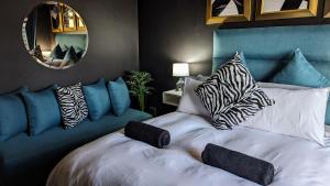 Ένα ή περισσότερα κρεβάτια σε δωμάτιο στο Premium Stay in Central Johannesburg Cultural Heart - Hallmark House