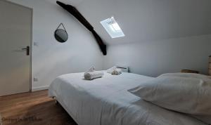 Postel nebo postele na pokoji v ubytování O' Clocher Tors