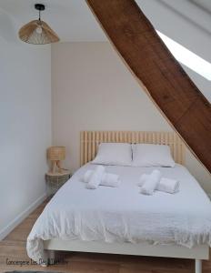 Postel nebo postele na pokoji v ubytování O' Clocher Tors