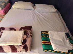 Ένα ή περισσότερα κρεβάτια σε δωμάτιο στο Nomad Traditional Tent