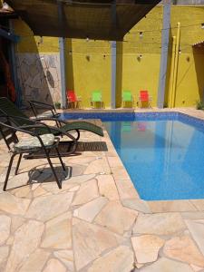 Bazén v ubytování Quarto Privado em Santana de Parnaíba nebo v jeho okolí