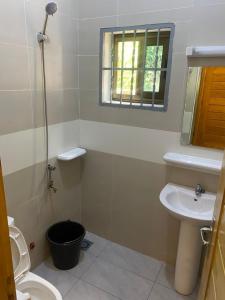 Et badeværelse på Studio meublé climatisé propre et sécurisé