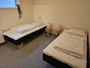 Postel nebo postele na pokoji v ubytování Dream Sleep Inn