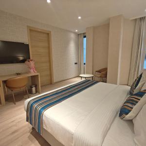 Μια τηλεόραση ή/και κέντρο ψυχαγωγίας στο Bluestone Prime by The Cosy Hotels