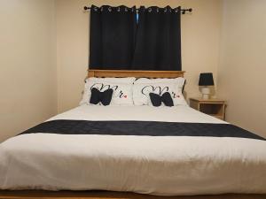 Ένα ή περισσότερα κρεβάτια σε δωμάτιο στο Listowel Town