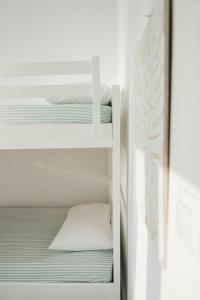 Ένα ή περισσότερα κρεβάτια σε δωμάτιο στο Agapi