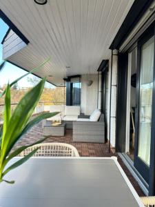 Balkón nebo terasa v ubytování Wunderschöne Familienvilla mit Schlossblick