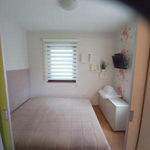 Ένα ή περισσότερα κρεβάτια σε δωμάτιο στο Konak 23,apartman4