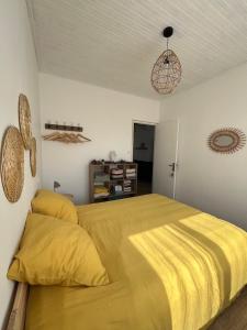 Postel nebo postele na pokoji v ubytování La Parenthèse de la Presqu'île - Beach - Bikes + 8 fotografií