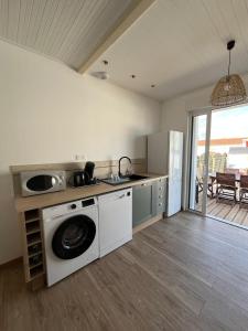 Kuchyň nebo kuchyňský kout v ubytování La Parenthèse de la Presqu'île - Beach - Bikes