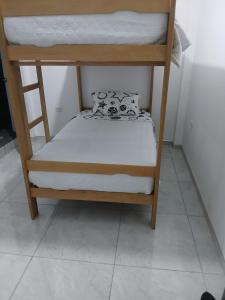 Postel nebo postele na pokoji v ubytování Hostal Marina