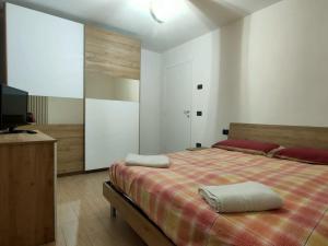 Ένα ή περισσότερα κρεβάτια σε δωμάτιο στο La casa di Nicole +28 φωτογραφίες