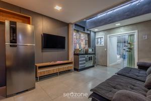 Μια τηλεόραση ή/και κέντρο ψυχαγωγίας στο Casa c/ Churrasqueira a 550 m da Praia PDD0572